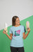 Free Front View Of Woman In T-Shirt Holding Sneakers Psd