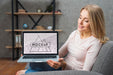 Free Front View Of Woman On Sofa Holding Laptop Psd