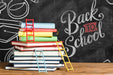 Free Front View Pile Of Books With Chalkboard Psd