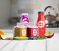 Free Front View Variety Of Containers Filled With Fruit Juice Psd