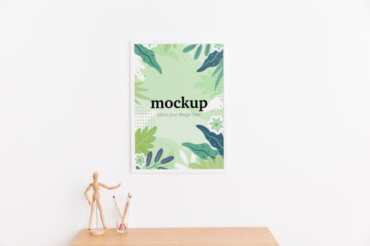 Free Front View White Mock-Up Frame On White Wall Psd