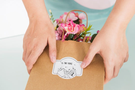 Free Gardening Concept With Woman Holding Bag With Flowers Psd