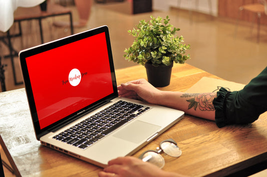 Free Girl Using Macbook Pro Mockup 2018
