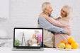 Free Grandparents Behind Laptop Mockup Psd
