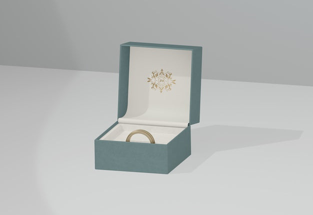 Free Green Jewelry Box With Golden Wedding Ring Psd