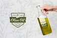 Free Hand Holding Olive Oil Psd
