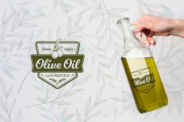 Free Hand Holding Olive Oil Psd