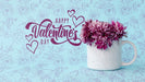 Free Happy Valentines Day Lettering Next To Cup With Flowers Psd