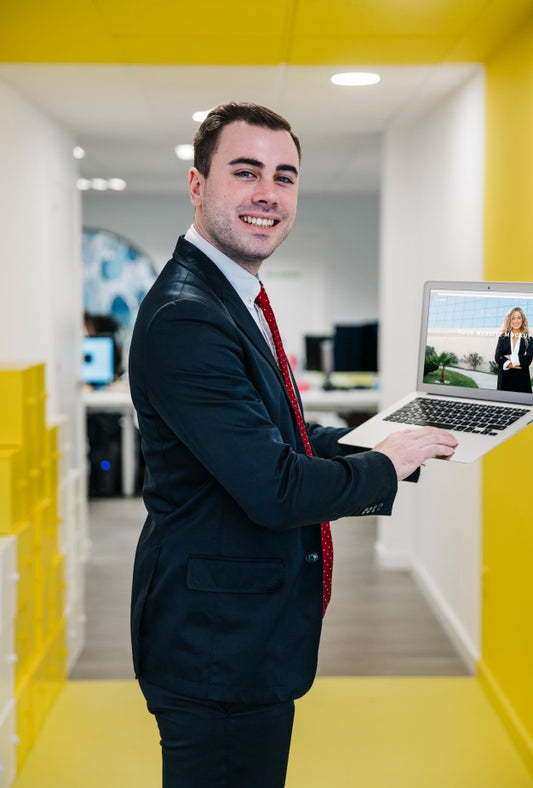 Free Laptop Mockup With Businessman Psd