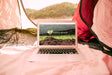 Free Laptop Mockup With Camping In Nature Concept Psd