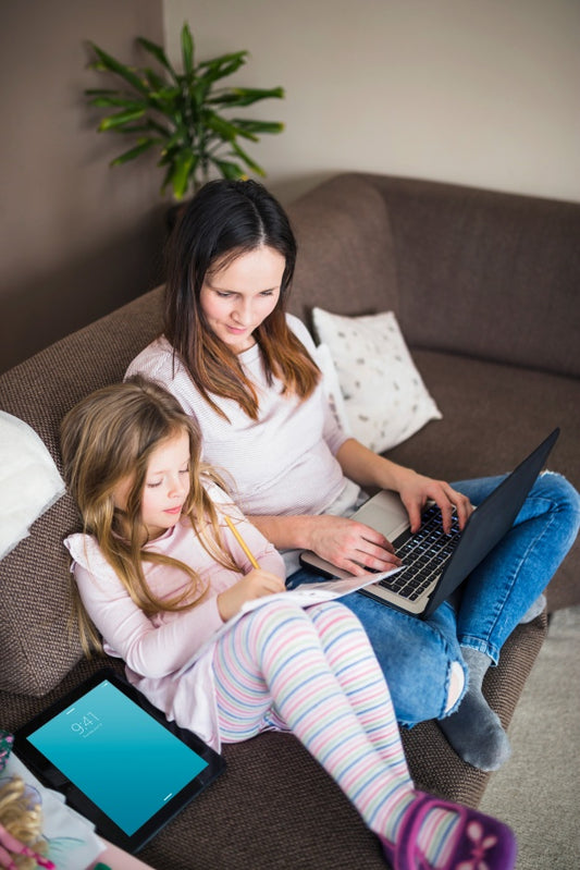 Free Laptop Mockup With Mother And Daughter Psd