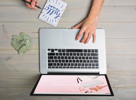Free Laptop Mockup With Person Typing On Keyboard Psd