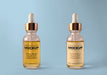 Free Little Colored Dropped Bottle Mockup Psd