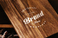Free Logo On Wooden Table Mock Up Psd