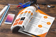Free Magazine And Smartphone Mockup On Wooden Table With Pens And Rulers Psd