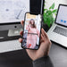 Free Man Holding Smartphone Mockup Psd 2019