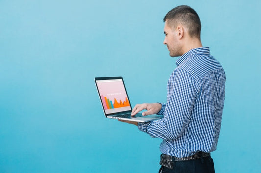 Free Man Presenting Laptop Mockup Psd