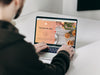 Free Man Using Macbook Pro Mockup