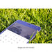 Free Mobile Phone On Grass Mock Up Psd