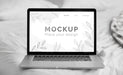 Free Mock Up Laptop In Bedroom Psd