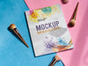 Free Mock Up Magazine Next To Makeup Brushes Psd
