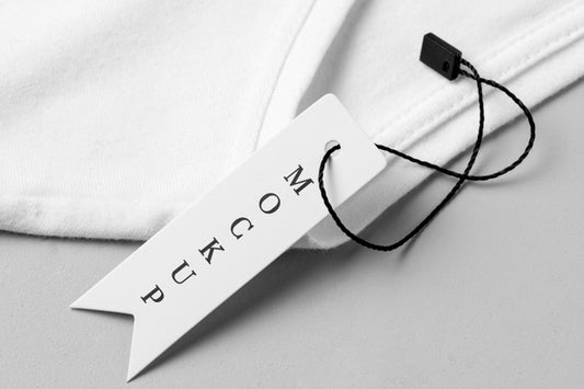 Free Mock-Up Of Clothing Label On White Fabric Psd