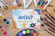 Free Mock-Up Paper Surrounded By Paint Brushes Psd