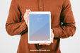 Free Mock Up With Young Man Holding Tablet Psd