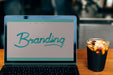 Free Mockup Of A Laptop Screen With A Glass Of Drink Psd