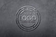 Free Mockup Of Shining Metallic Logo On Stone Wall Psd