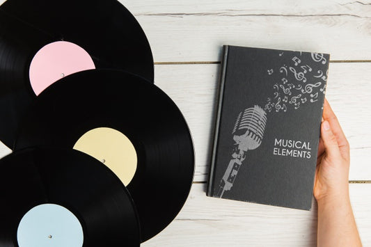 Free Music Elements Book With Vinyl Records Top View Psd