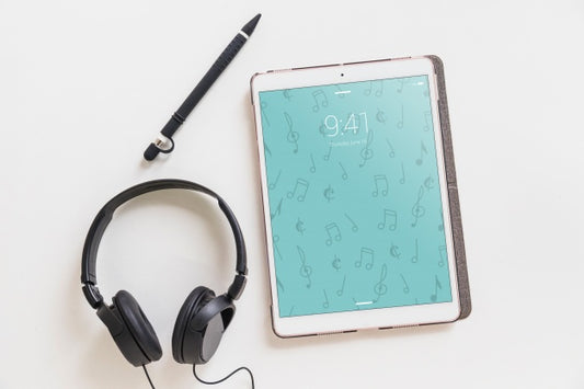 Free Music Mockup With Headphones Next To Tablet Psd