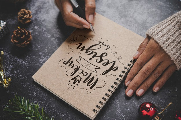 Free Notebook Mockup With Christmas Decoration Psd