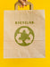Free Person Holding A Paper Bag Mock-Up Psd