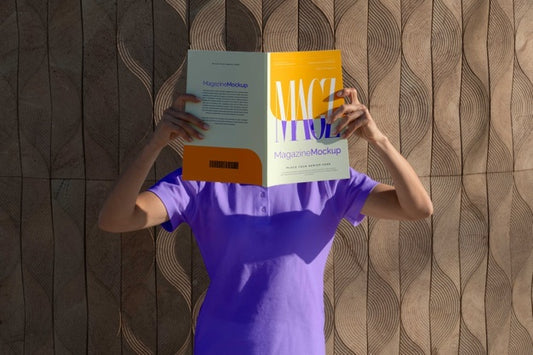 Free Person Reading Color Pop Magazine With Cover Mockup Psd