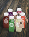 Free Plastic Bottles With Different Fruit Or Vegetable Juices With Labels Psd