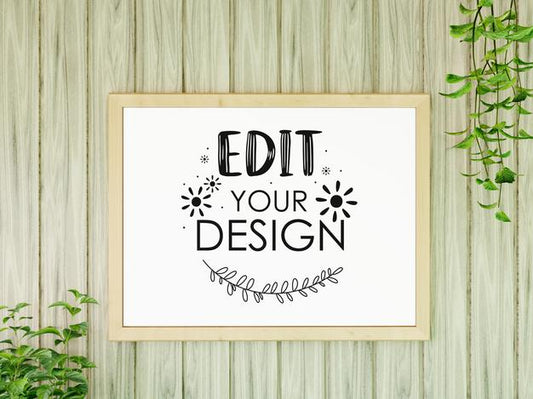 Free Poster Frame Mockup On The Wall With Plant Psd