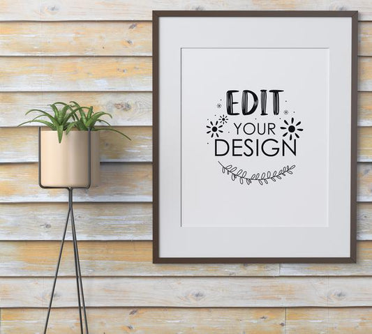 Free Poster Frame Mockup On The Wall With Plant Psd