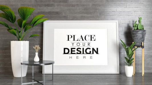 Free Poster Frame Mockup On The Wall With Plant Psd