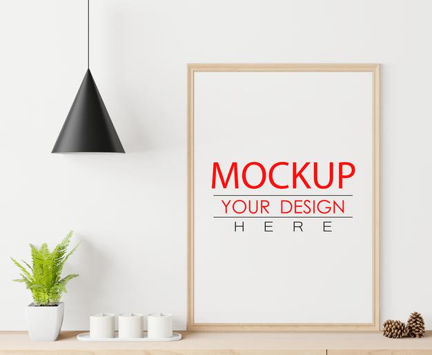 Free Poster Frame Mockup On The Wall With Plant Psd