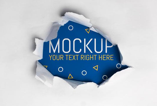 Free Ripped Paper Over Blue Background Mockup Psd