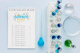Free Science Elements Arrangement With Notepad Mock-Up Psd