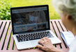 Free Senior Woman Using A Laptop On Vacation