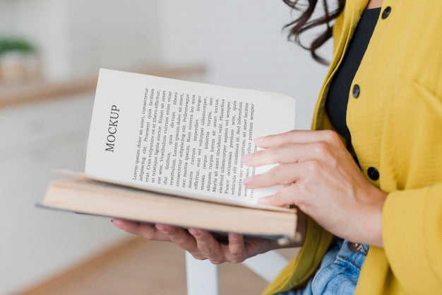 Free Side View Woman Reading From A Mock-Up Book Psd