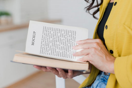 Free Side View Woman Reading From A Mock-Up Book Psd