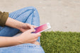 Free Smartphone Mockup With Person Using It Psd