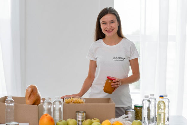Free Smiley Female Volunteer Preparing Food For Donation Psd