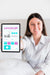 Free Smiley Woman Holding Tablet With Mock-Up Psd