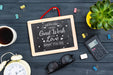 Free Stationery And Chalkboard In Workspace Psd