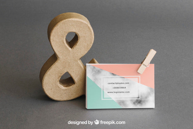 Free Stationery Mockup With Business Card Leaning Against Ampersand Psd
